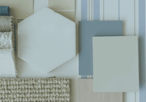 latlay mood board with textures of materials and samples in blues and natural colours